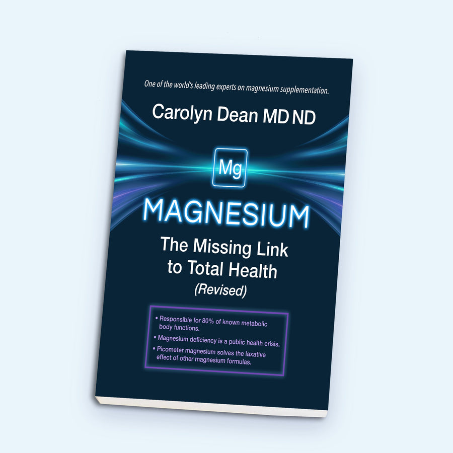 Magnesium: The Missing Link to Total Health (Revised) by Carolyn Dean MD ND, book shown at an angle